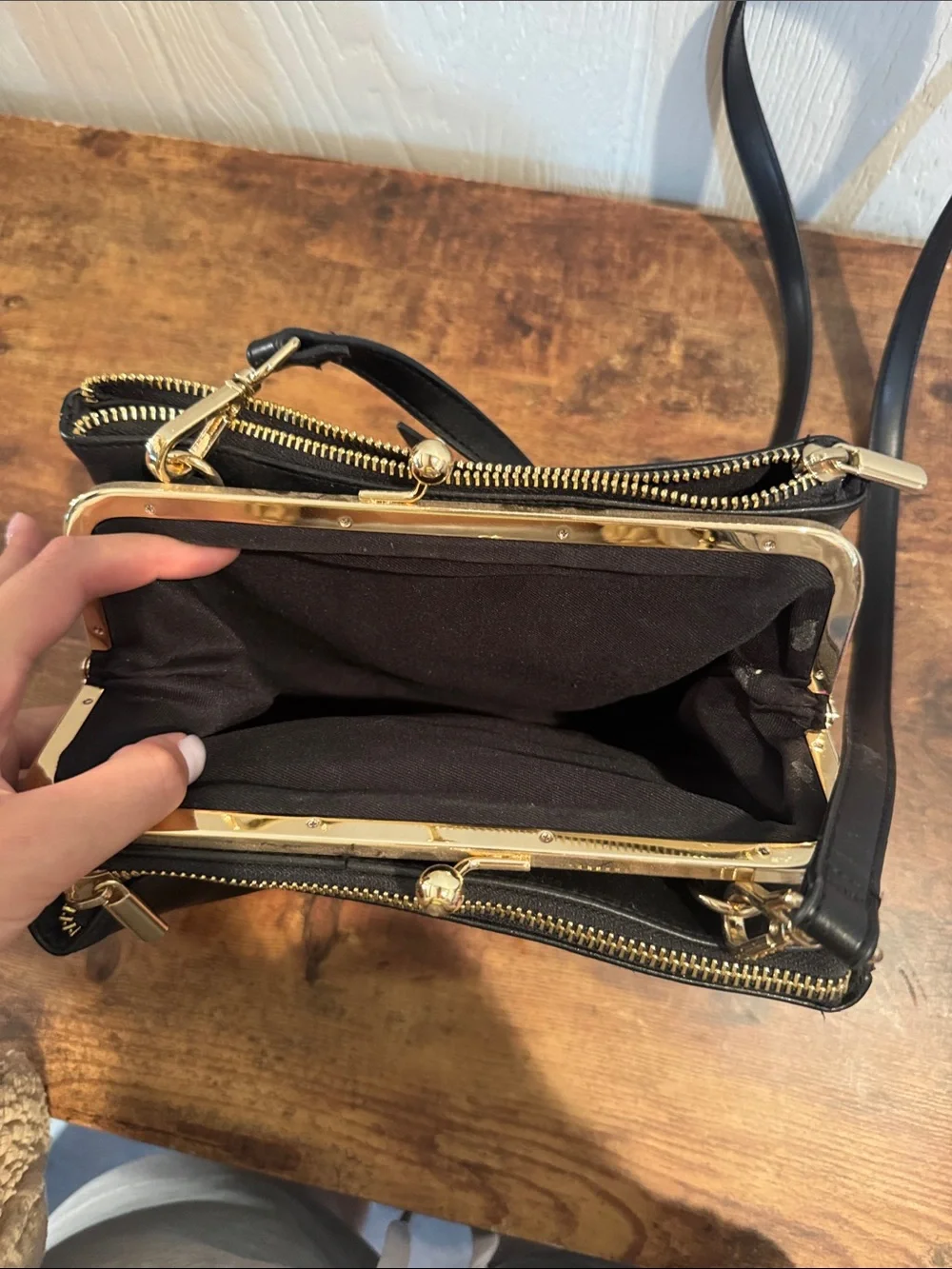 Classic Black Leather Crossbody Bag with Gold Hardware